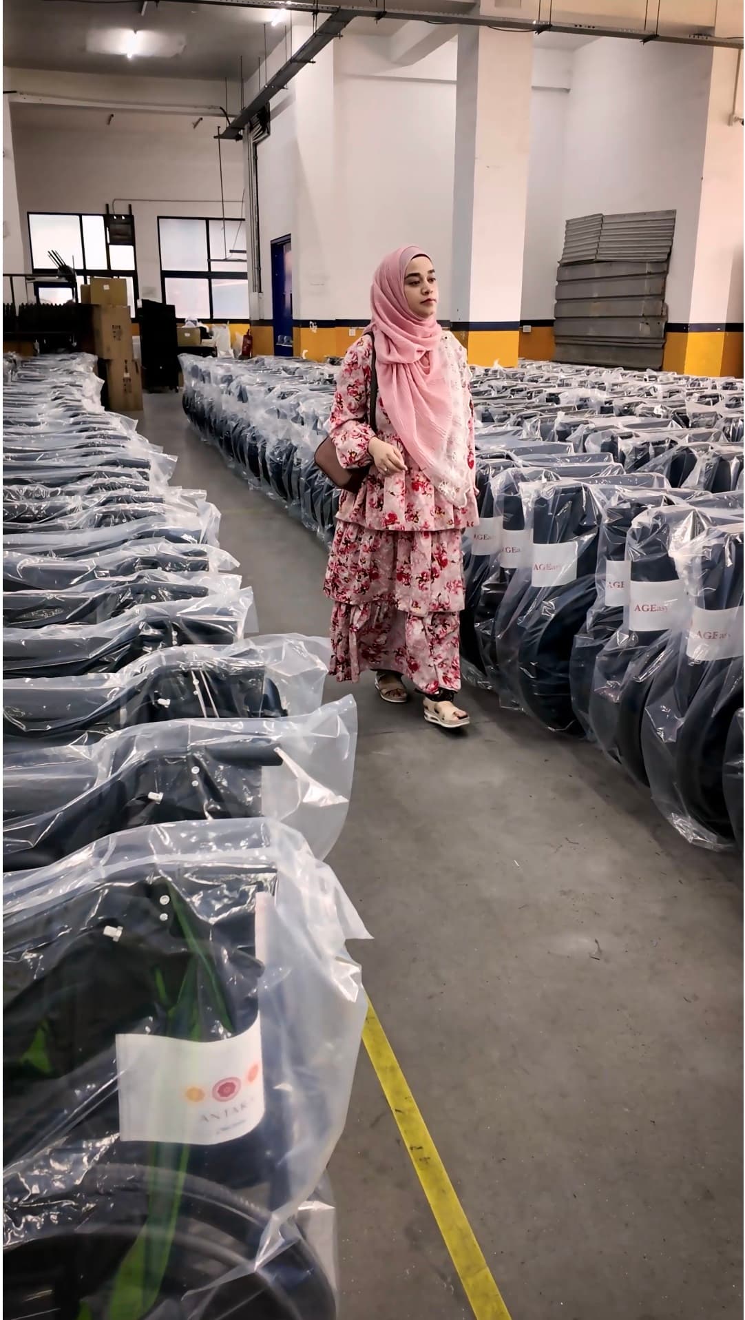 Rahat representative reviewing wheelchairs at the supplier facility
